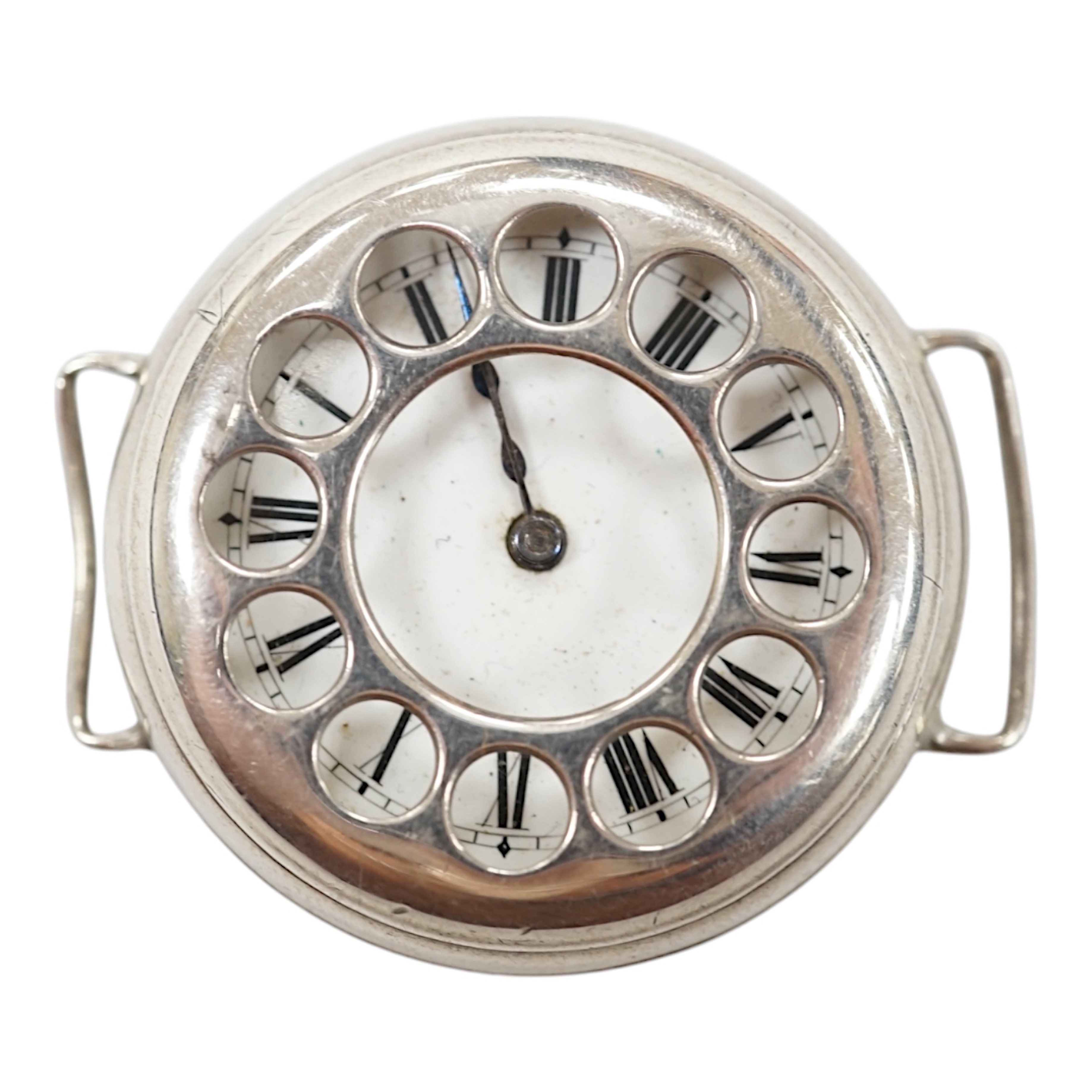 A George V silver manual wind trench watch with 'telephone dial' shrapnel guard, case import marked for London, 1917, case diameter 35mm, lacking winding crown. No strap. Condition - poor